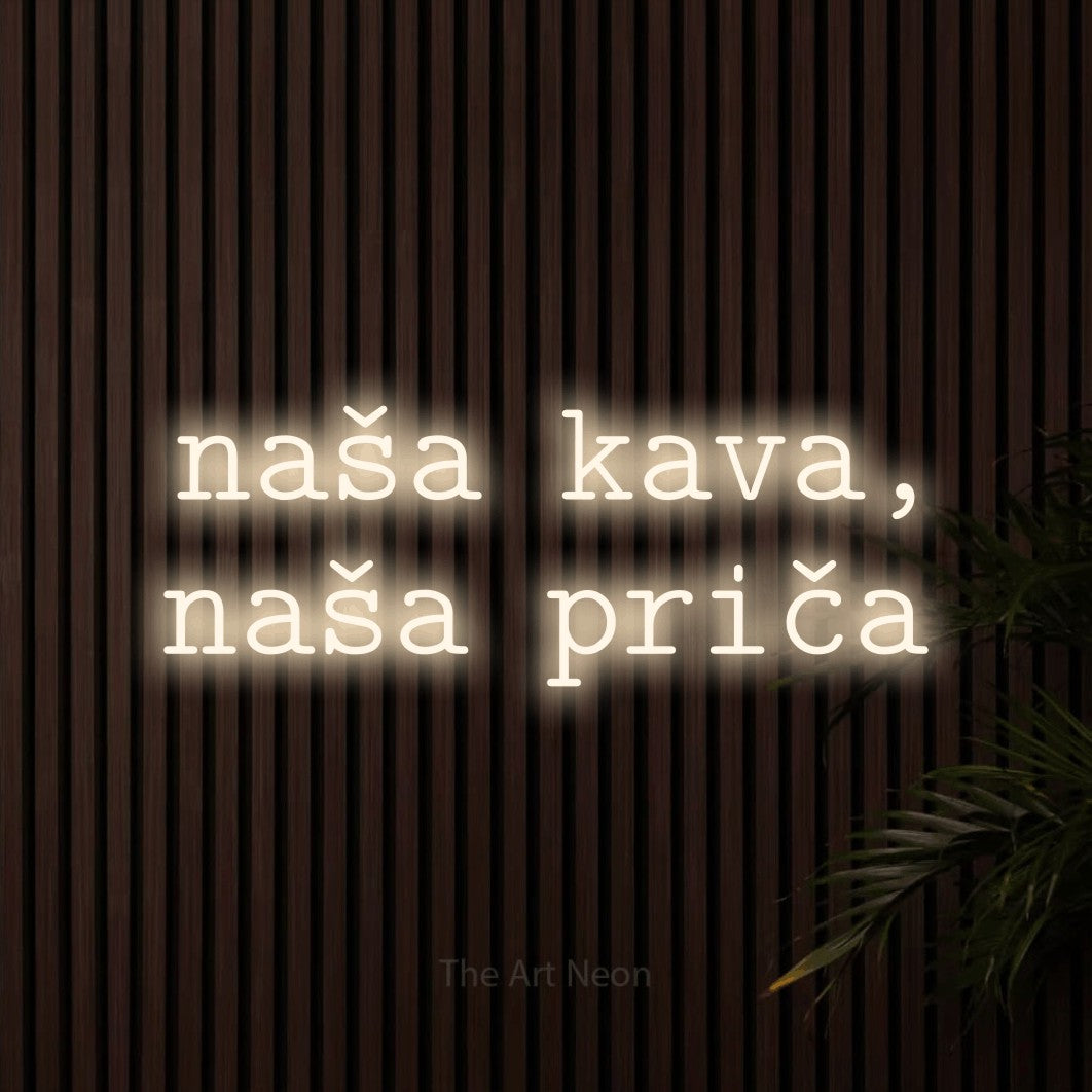 LED neon sign reading “naša kava, naša priča”, arranged in two lines.