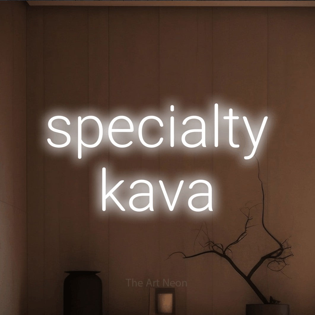 LED neon sign reading “specialty kava”, arranged in two lines.