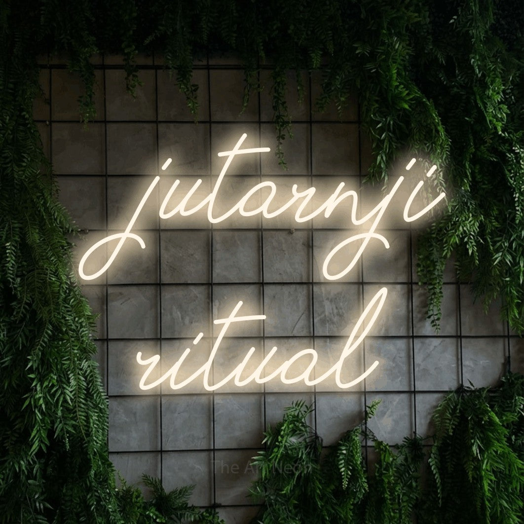 LED neon sign reading “jutarnji ritual”, arranged in two lines.