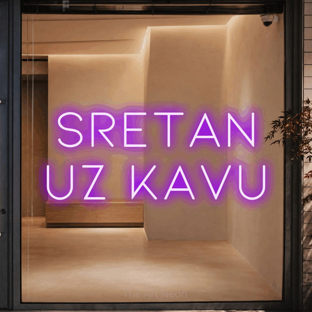 LED neon sign reading “SRETAN uz kavu”, arranged in two lines.