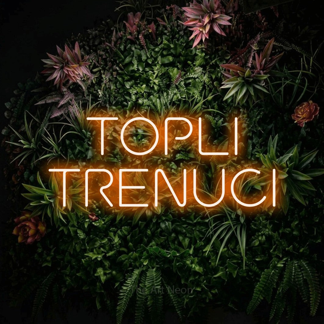 LED neon sign reading “TOPLI TRENUCI”, arranged in two lines.