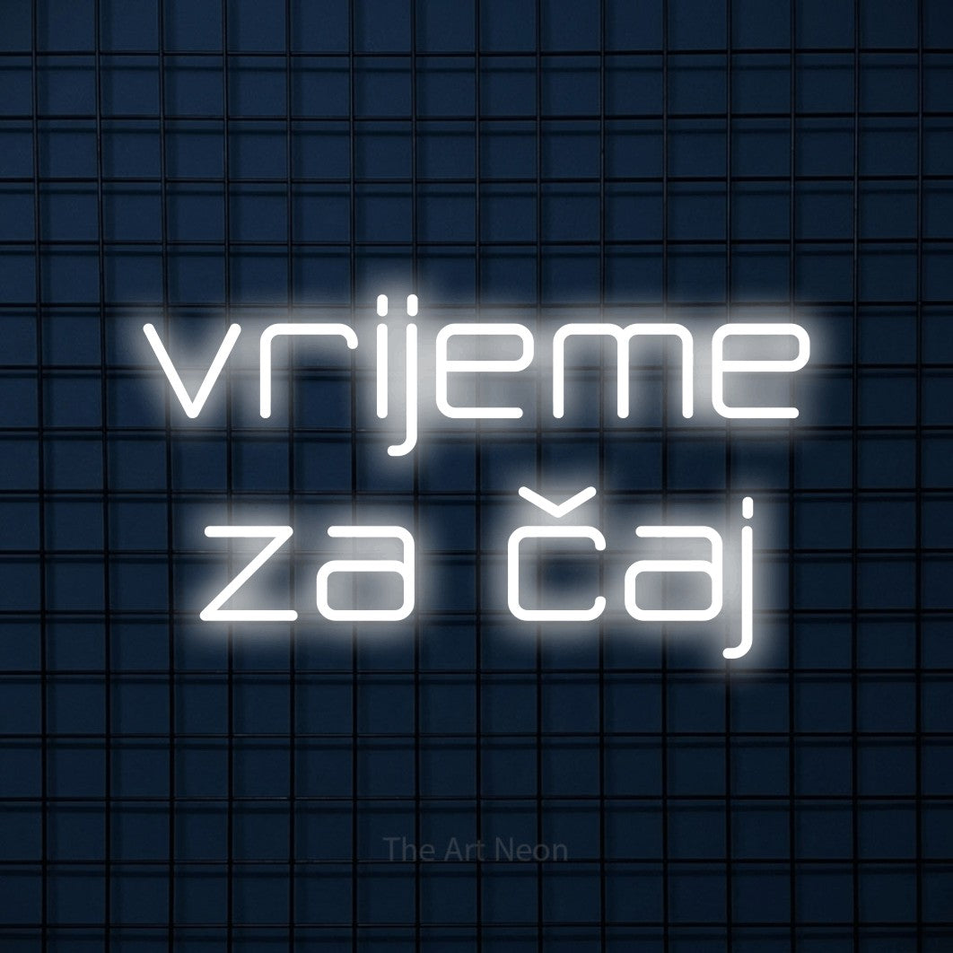 LED neon sign reading “vrijeme za čaj”, arranged in two lines.