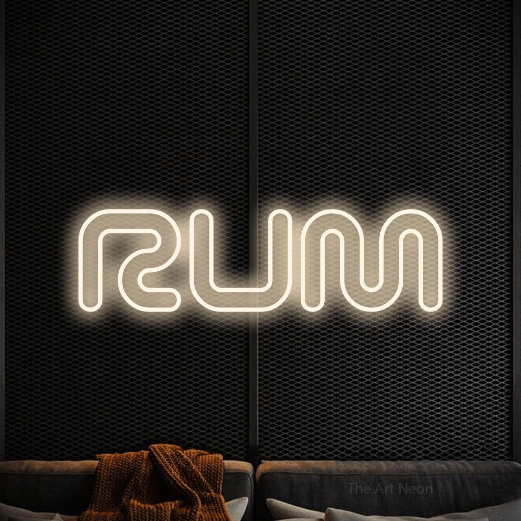 LED neon sign reading “RUM”, arranged in a single line.