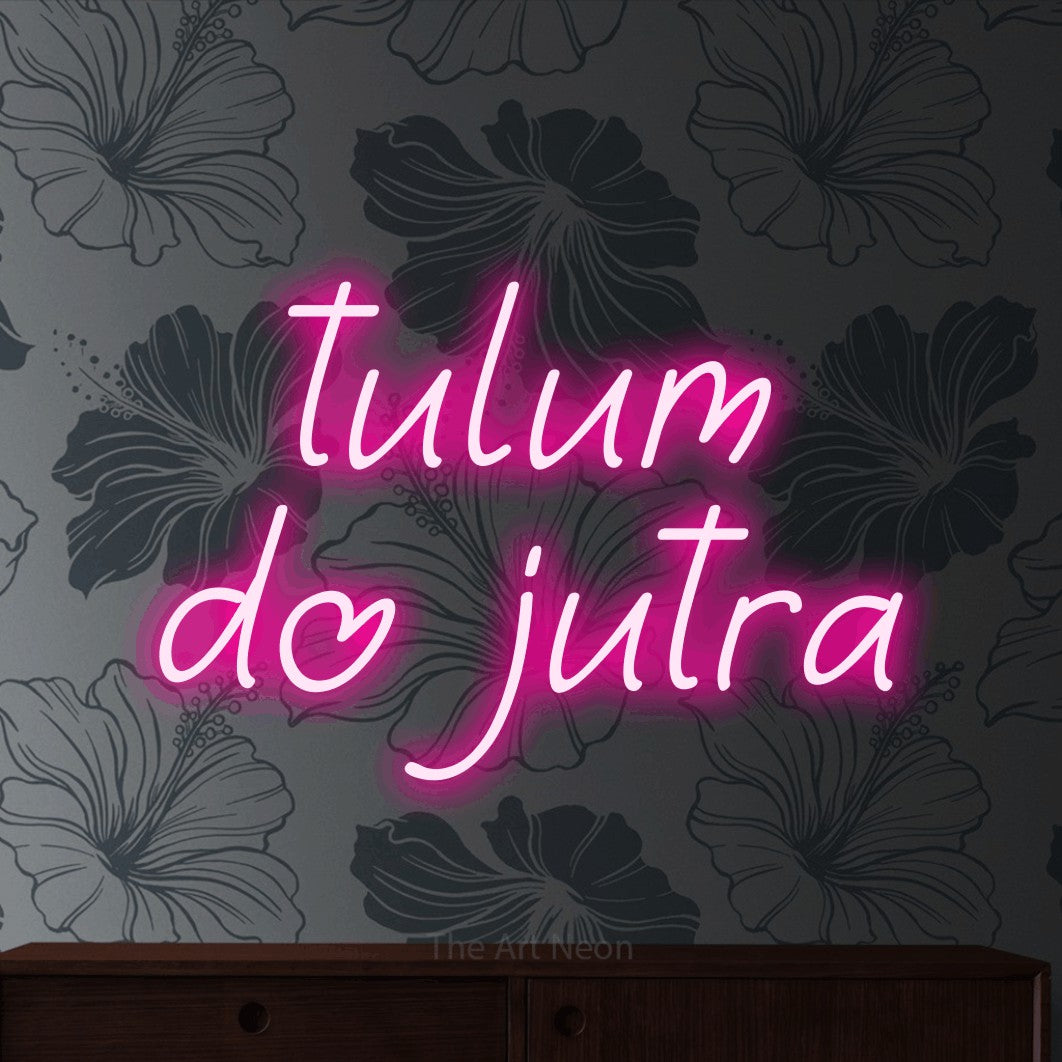 LED neon sign reading “tulum do jutra”, arranged in two lines.