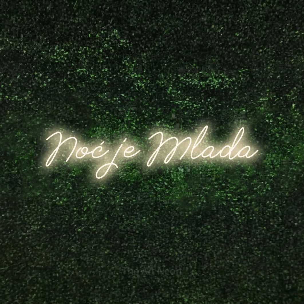 LED neon sign reading “Noć je Mlada”, arranged in a single line.