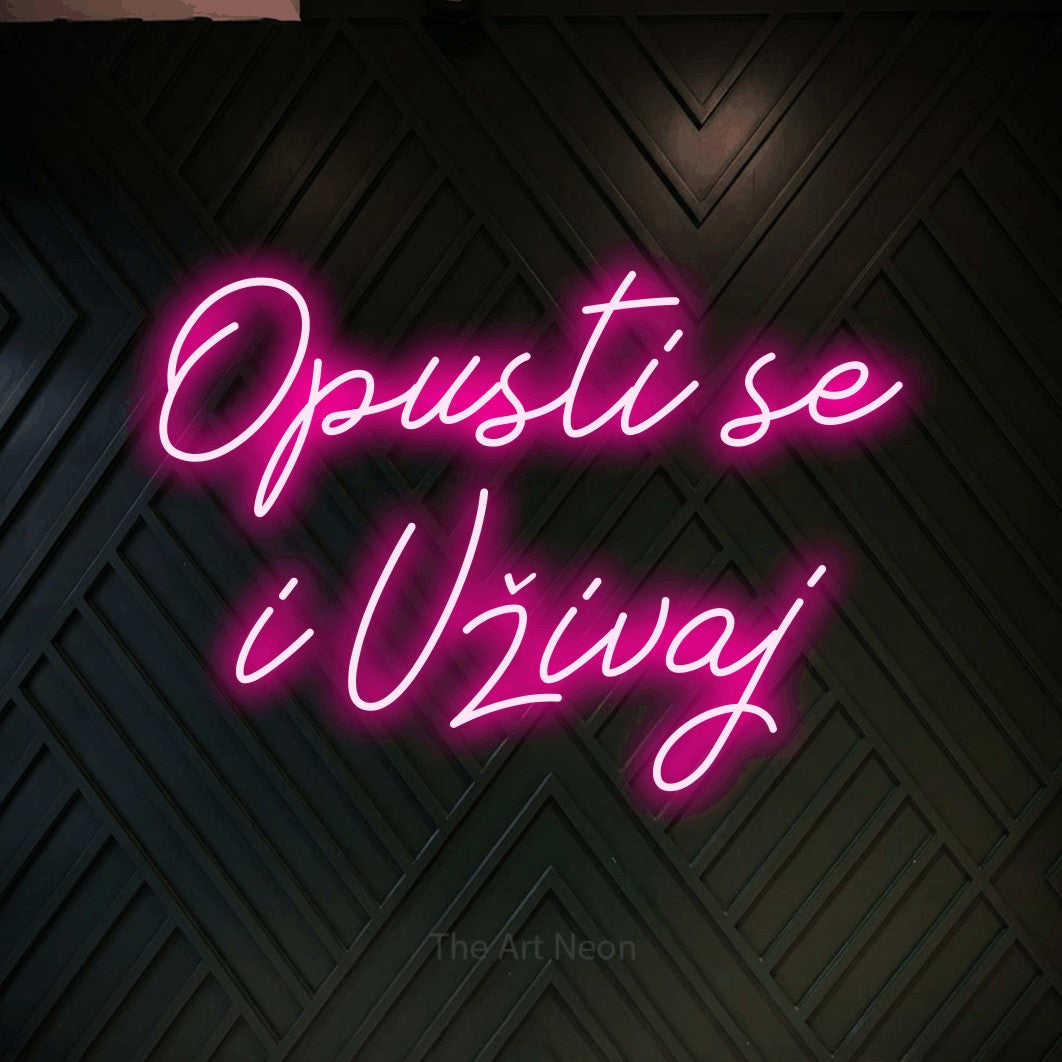 LED neon sign reading “Opusti se i Uživaj”, arranged in two lines.