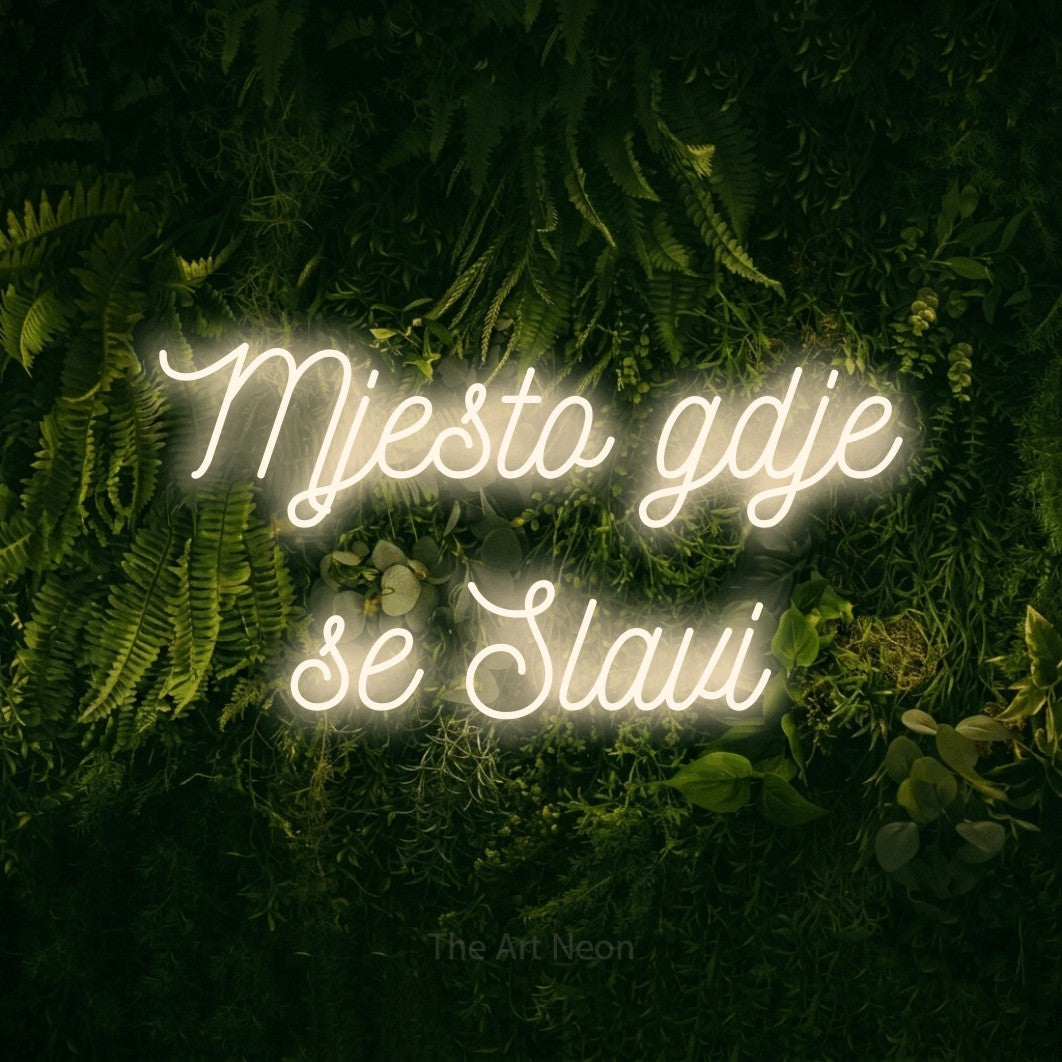 LED neon sign reading “Mjesto gdje se Slavi”, arranged in two lines.