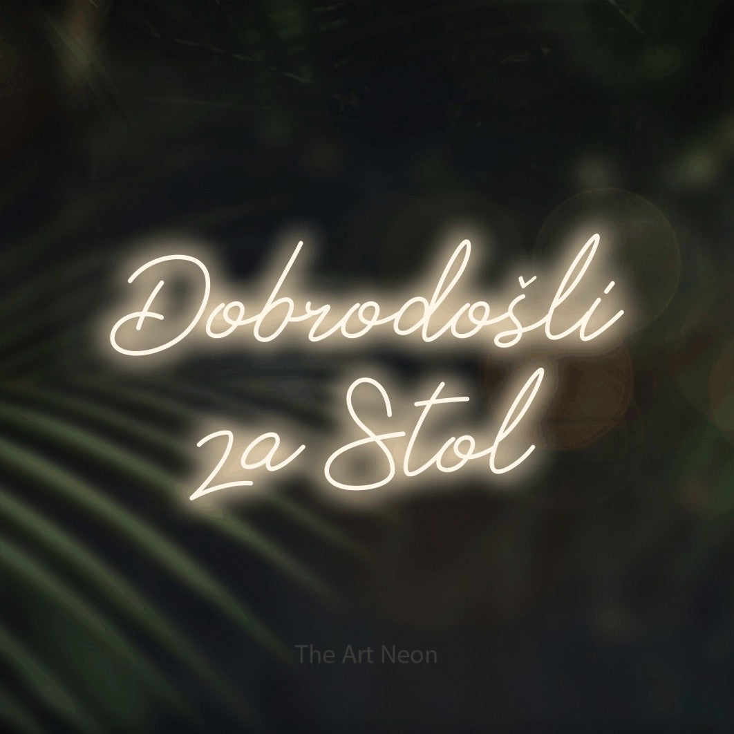 LED neon sign reading “Dobrodošli za Stol”, arranged in two lines.