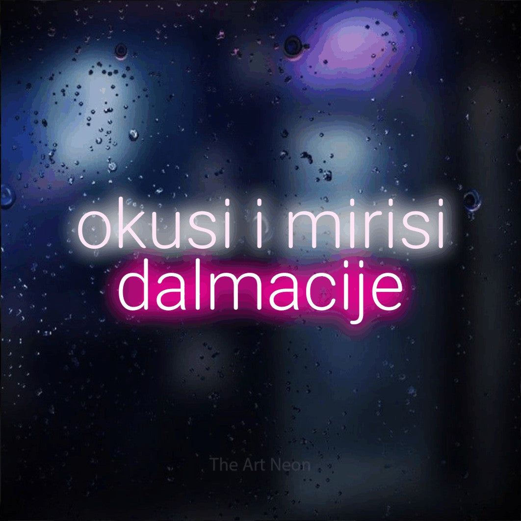 LED neon sign reading “okusi i mirisi dalmacije”, arranged in two lines.