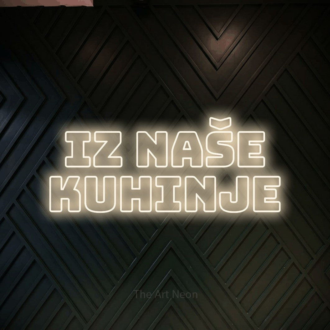 LED neon sign reading “iz naše kuhinje”, arranged in two lines.