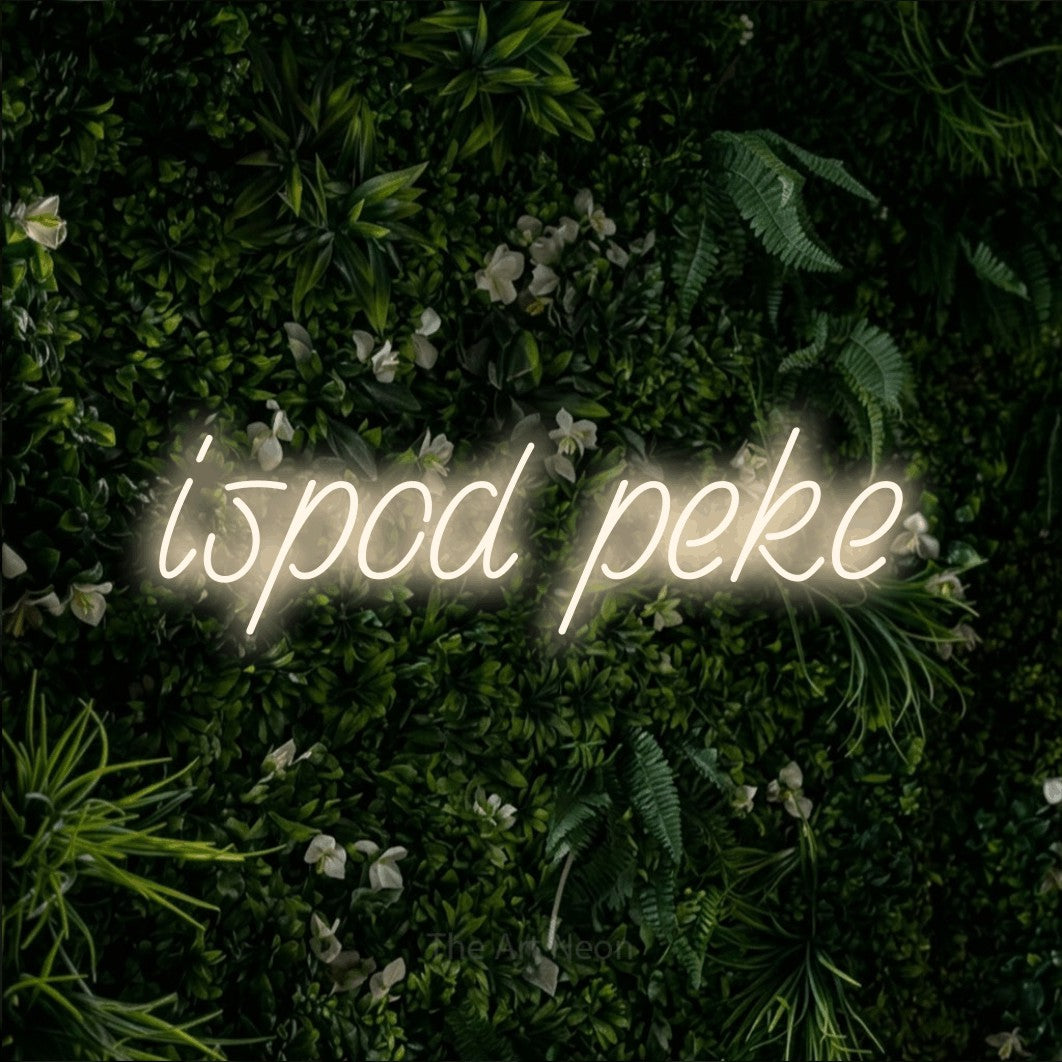 LED neon sign reading “ispod peke”, arranged in a single line.
