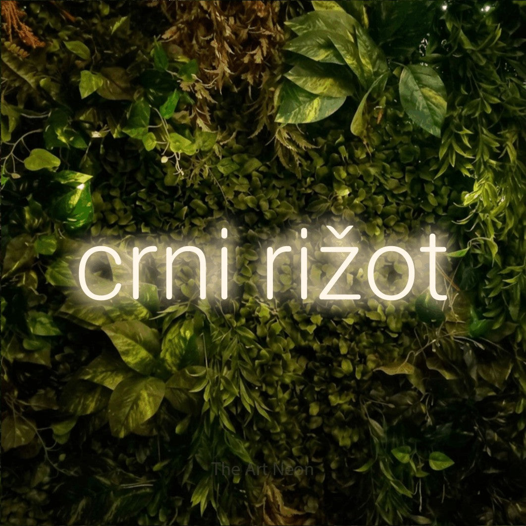 LED neon sign reading “crni rižot”, arranged in a single line.
