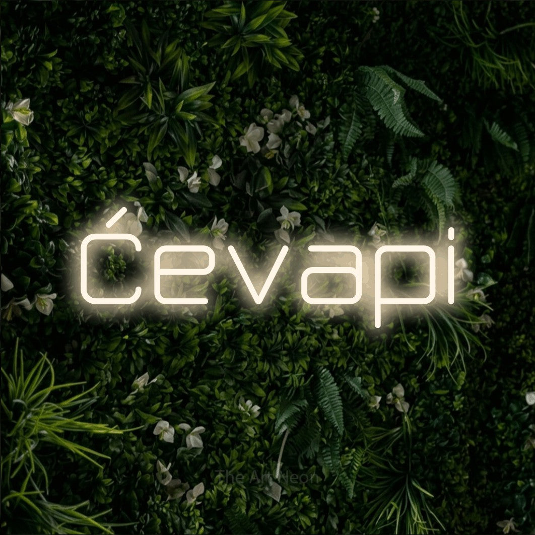 LED neon sign reading “Ćevapi”, arranged in a single line.