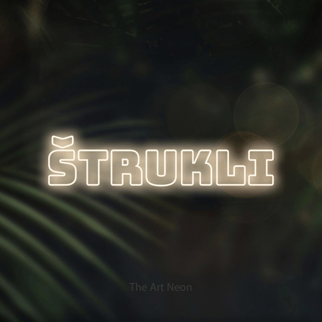 LED neon sign reading “Štrukli”, arranged in a single line.