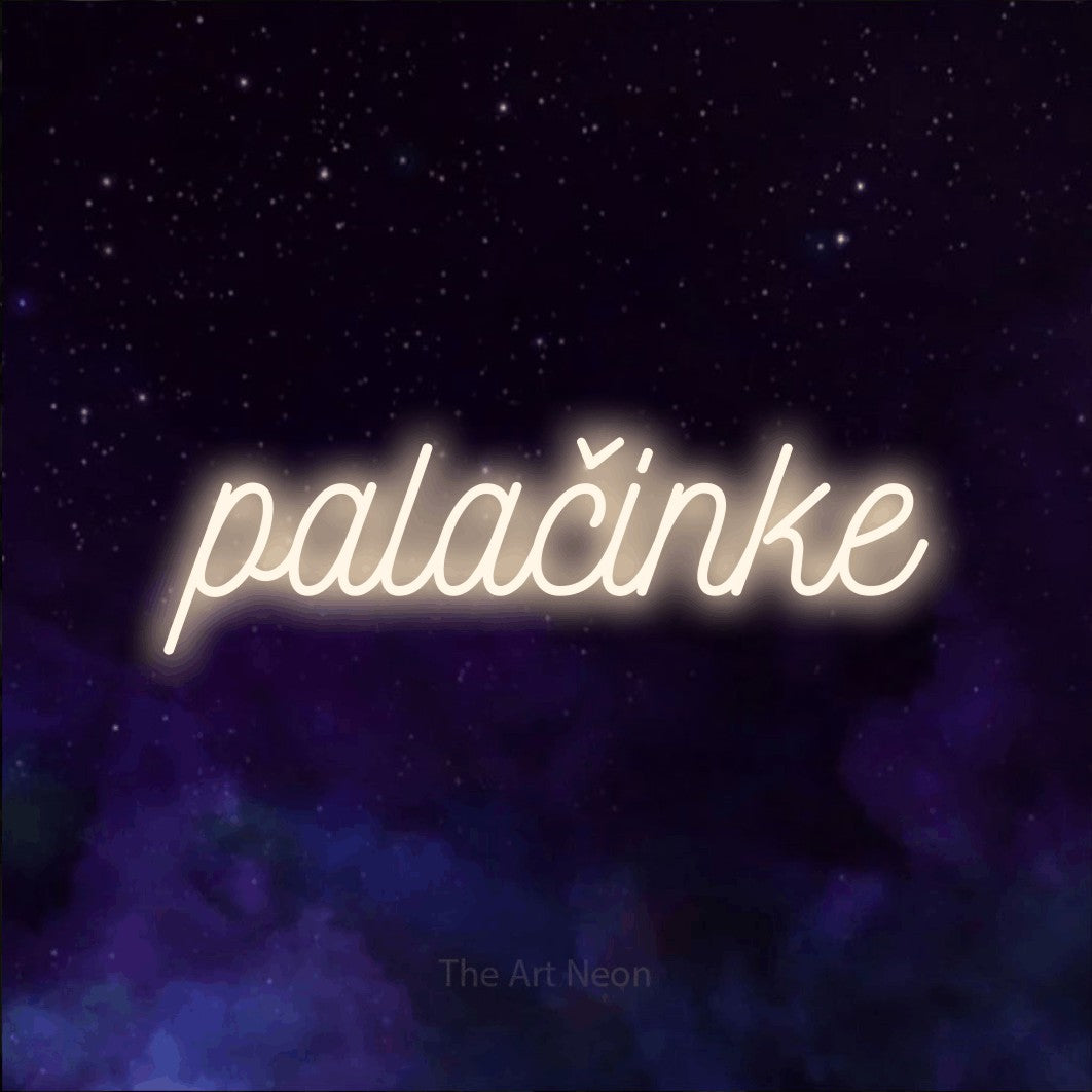 LED neon sign reading “palačinke”, arranged in a single line.