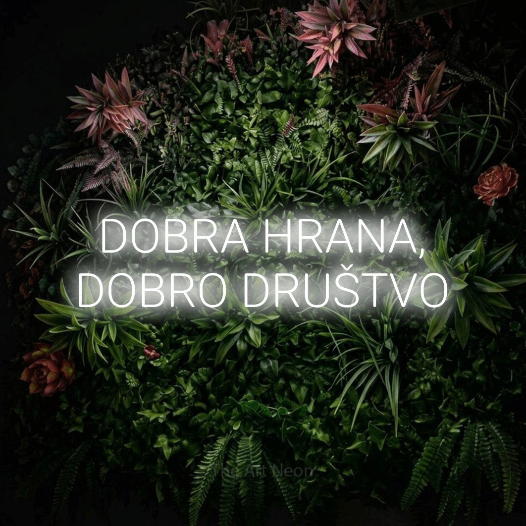 LED neon sign reading “DOBRA HRANA, DOBRO DRUŠTVO”, arranged in two lines.