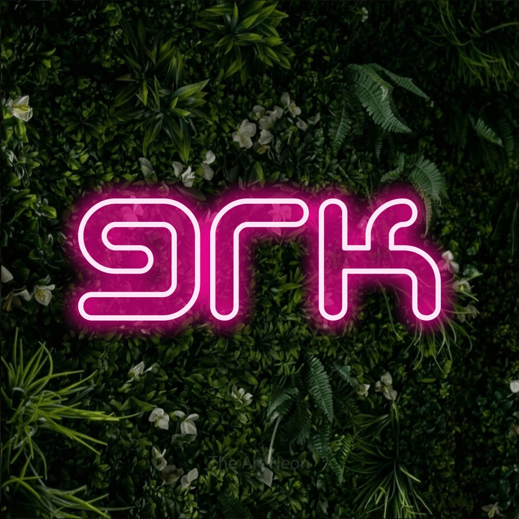 LED neon sign reading “grk”, arranged in a single line.