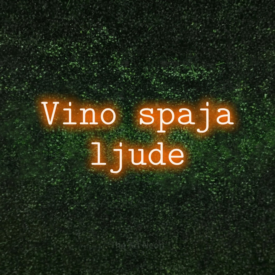 LED neon sign reading “Vino spaja ljude”, arranged in two lines.