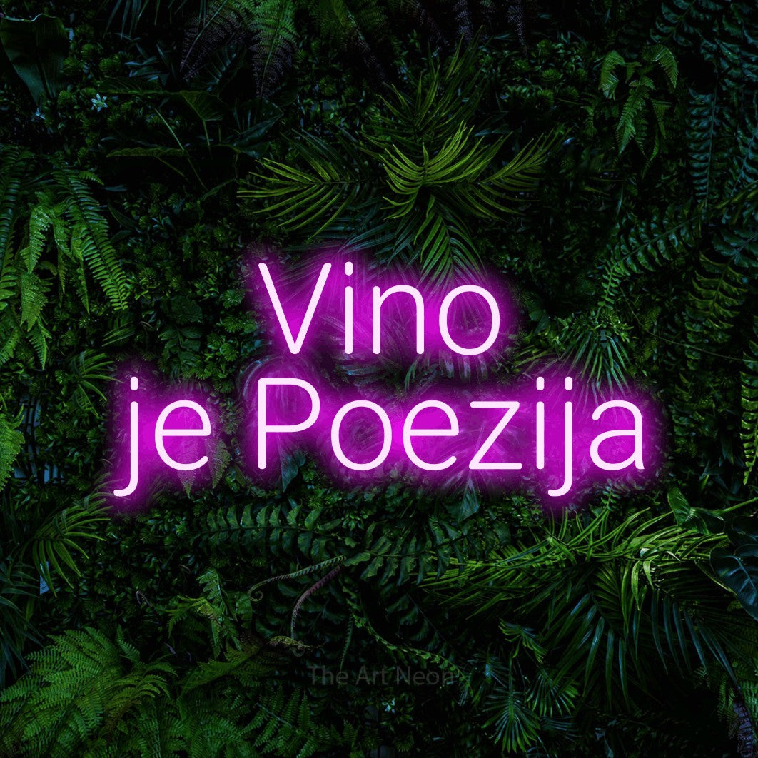 LED neon sign reading “Vino je Poezija”, arranged in two lines.