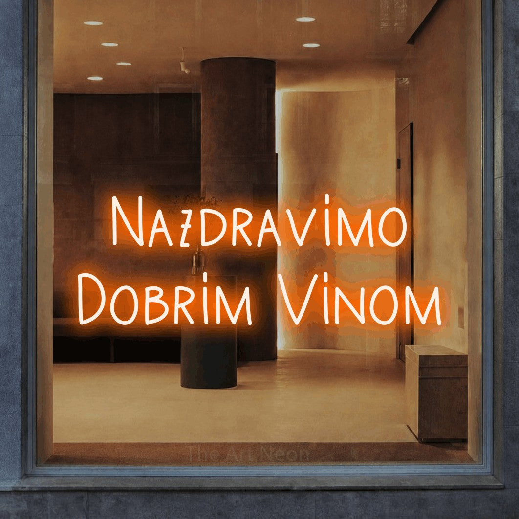 LED neon sign reading “Nazdravimo Dobrim Vinom”, arranged in two lines.