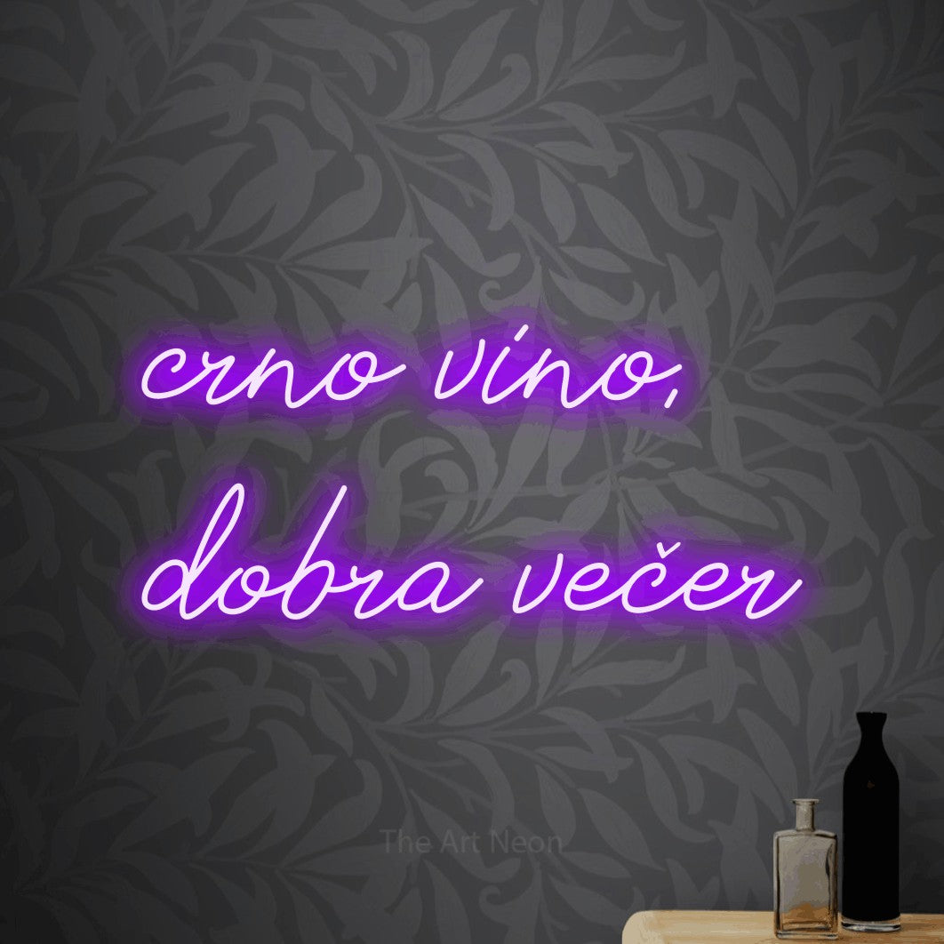 LED neon sign reading “crno vino, dobra večer”, arranged in two lines.