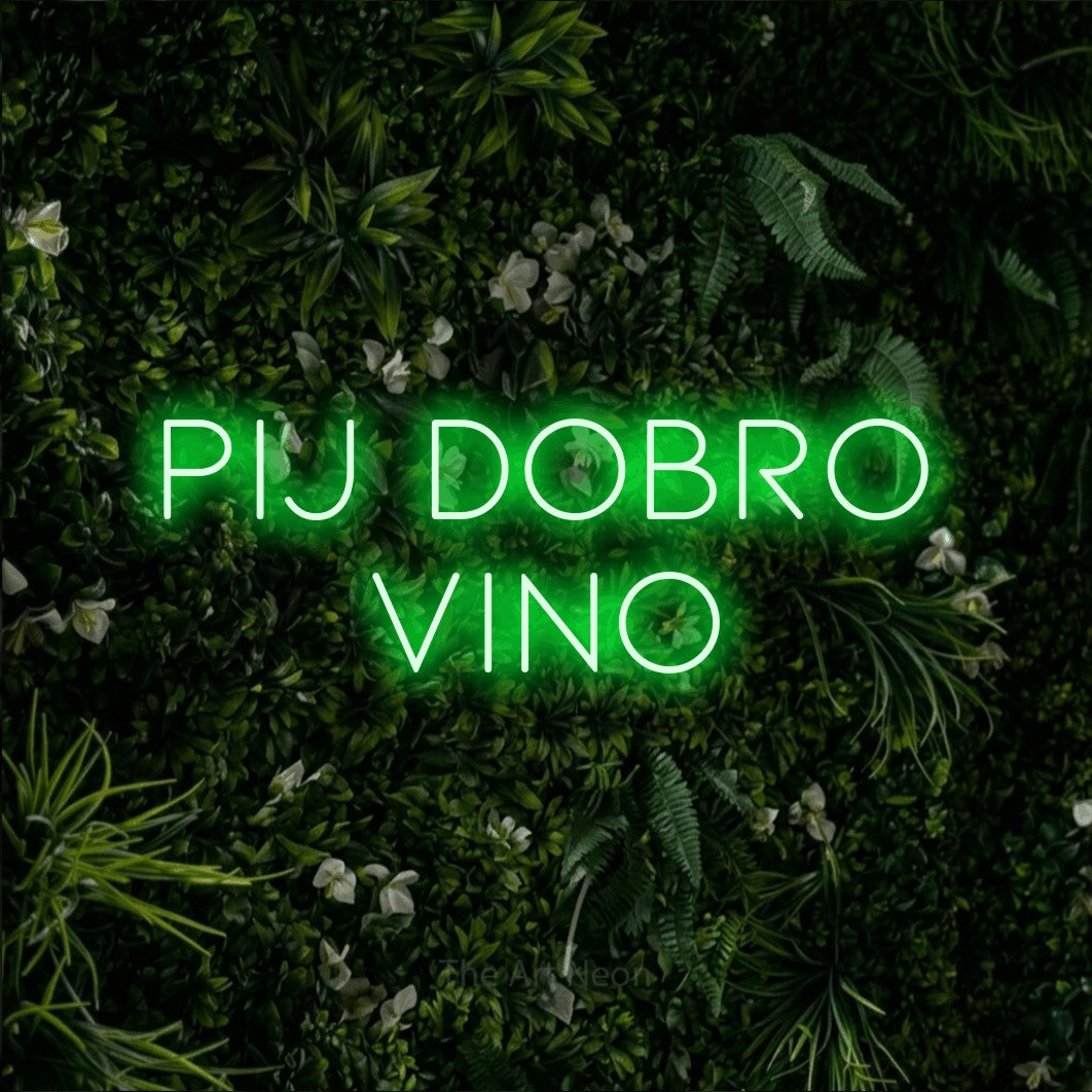 LED neon sign reading “PIJ dobro vino”, arranged in two lines.