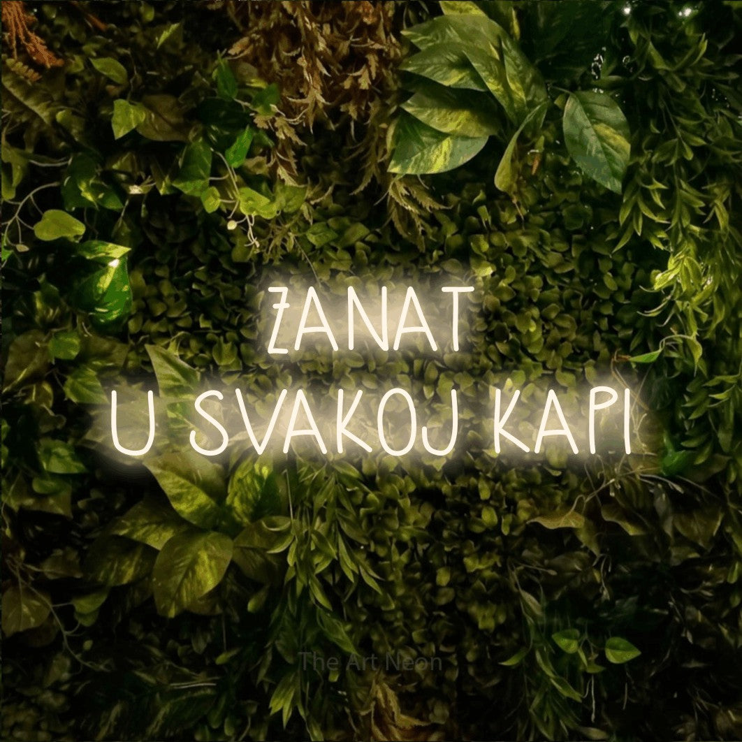 LED neon sign reading “ZANAT U SVAKOJ KAPI”, arranged in two lines.