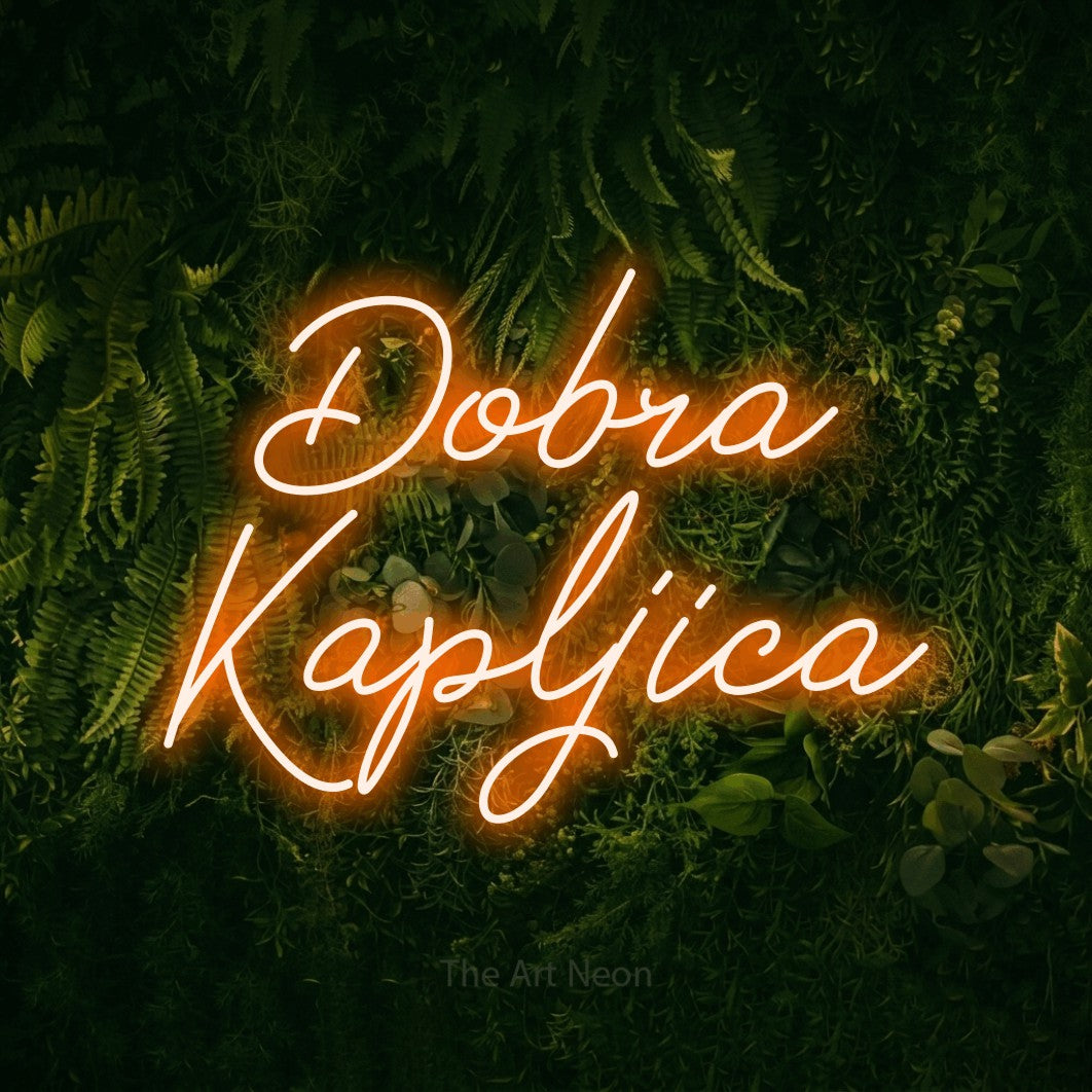 LED neon sign reading “Dobra Kapljica”, arranged in two lines.