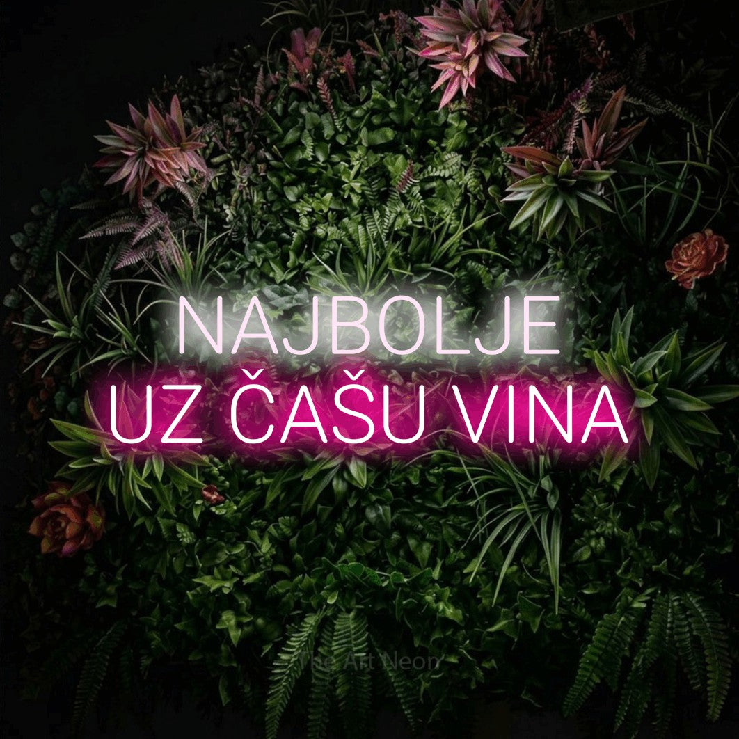 LED neon sign reading “NAJBOLJE UZ ČAŠU VINA”, arranged in two lines.