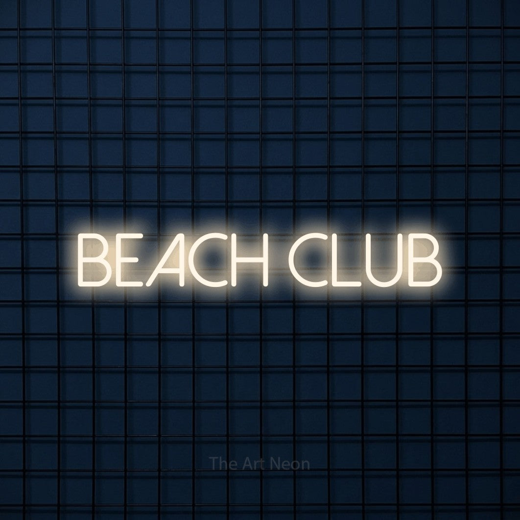 LED neon sign reading “Beach club”, arranged in a single line.