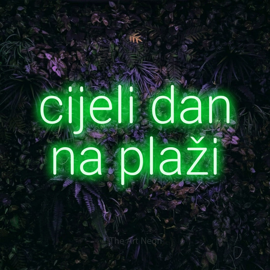 LED neon sign reading “cijeli dan na plaži”, arranged in two lines.