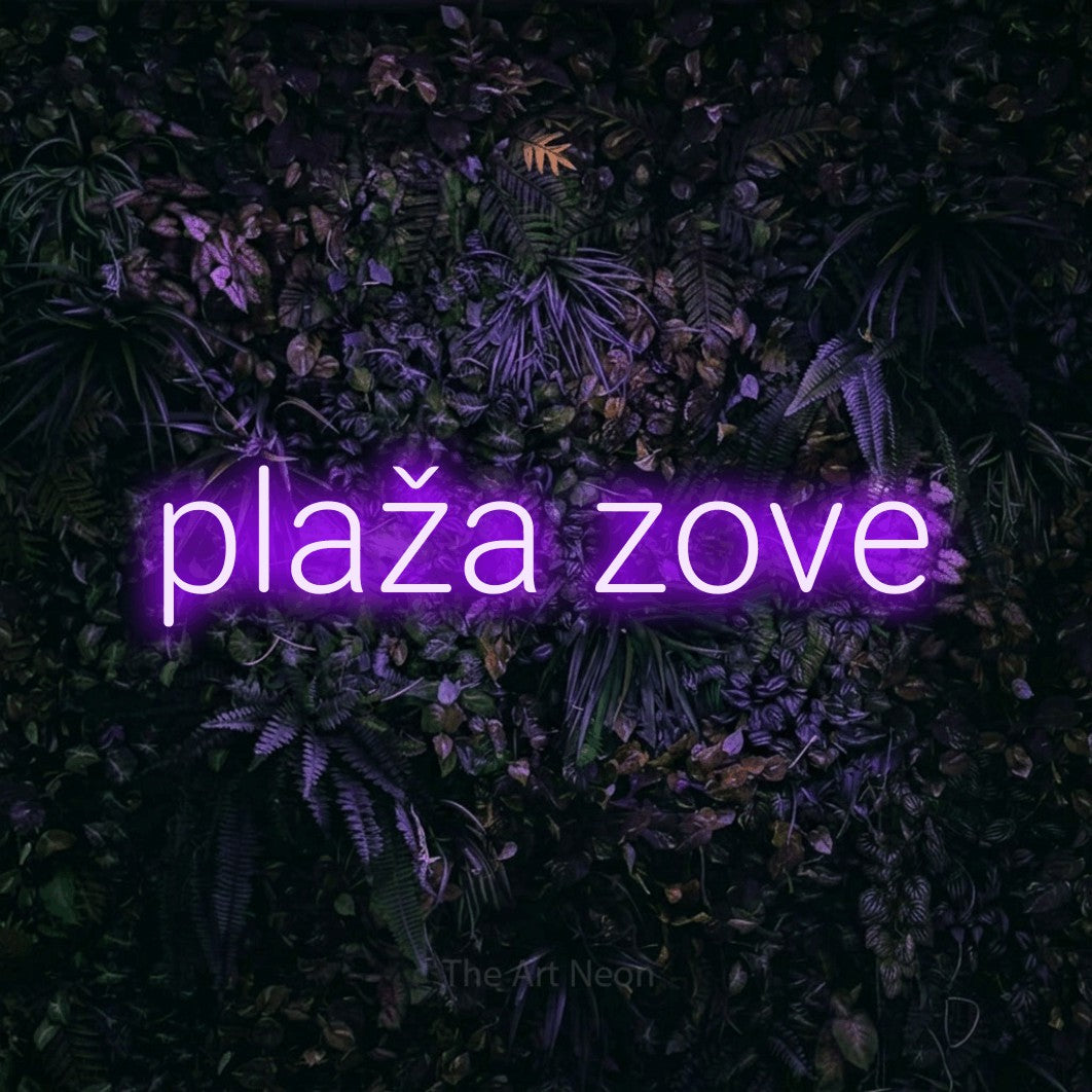 LED neon sign reading “plaža zove”, arranged in a single line.
