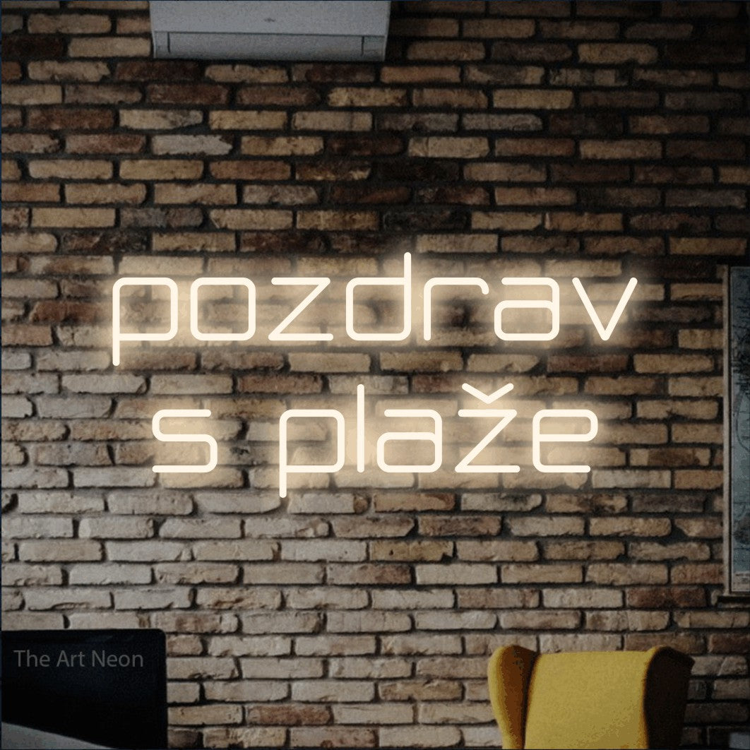 LED neon sign reading “pozdrav s plaže”, arranged in two lines.