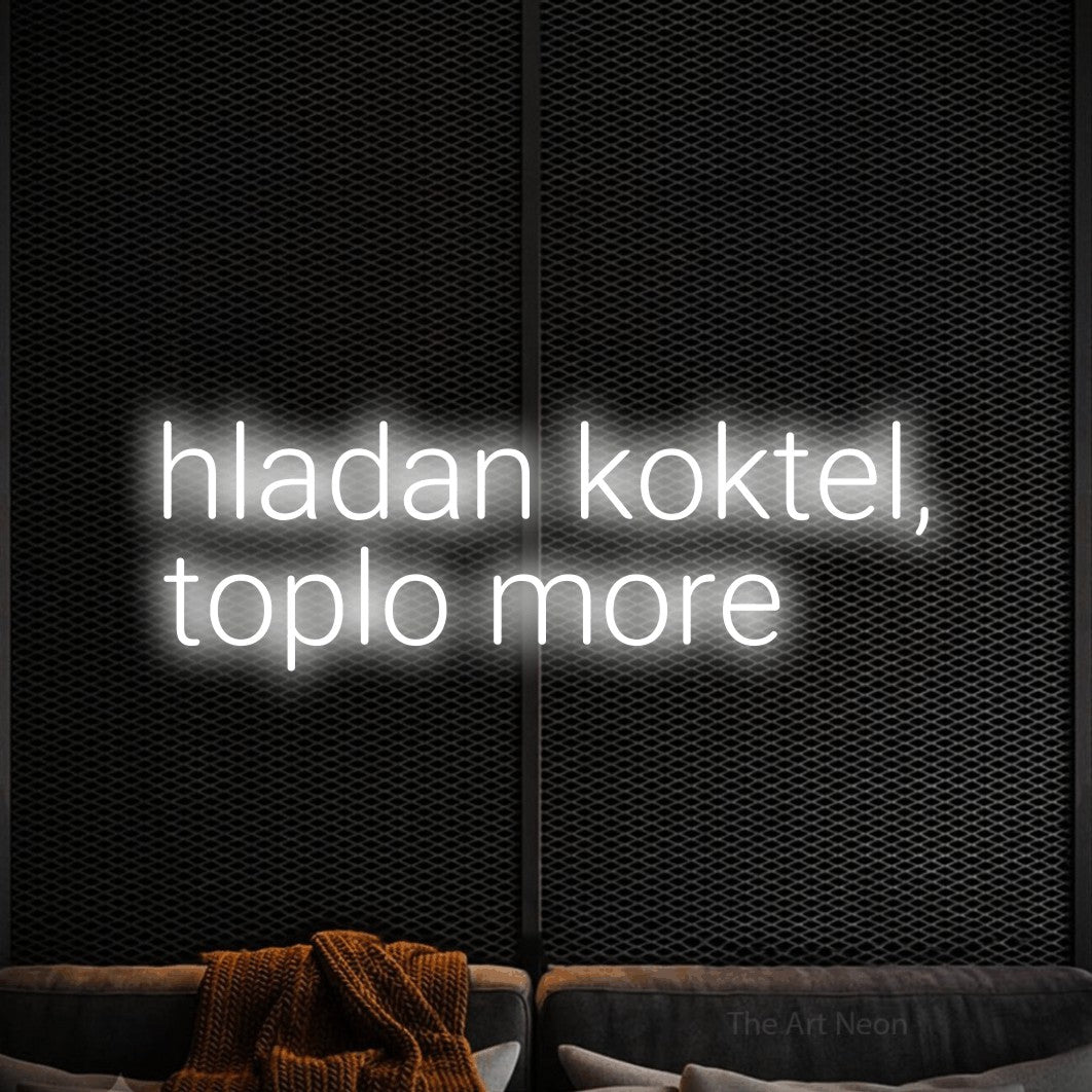 LED neon sign reading “hladan koktel, toplo more”, arranged in two lines.