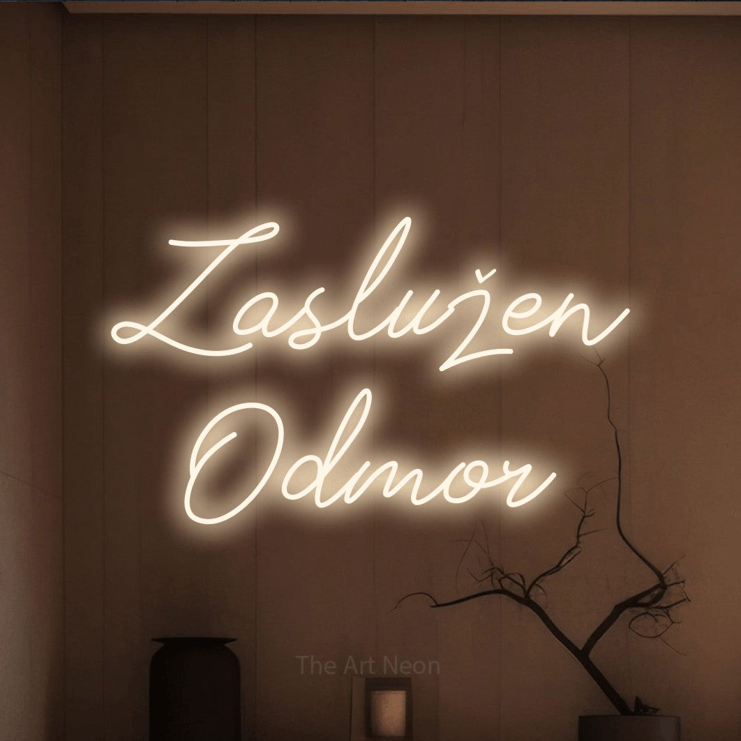 LED neon sign reading “Zaslužen Odmor”, arranged in two lines.