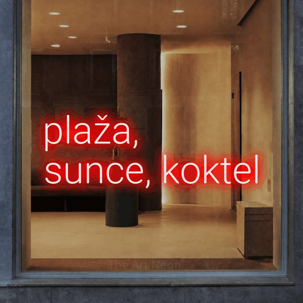 LED neon sign reading “plaža, sunce, koktel”, arranged in two lines.
