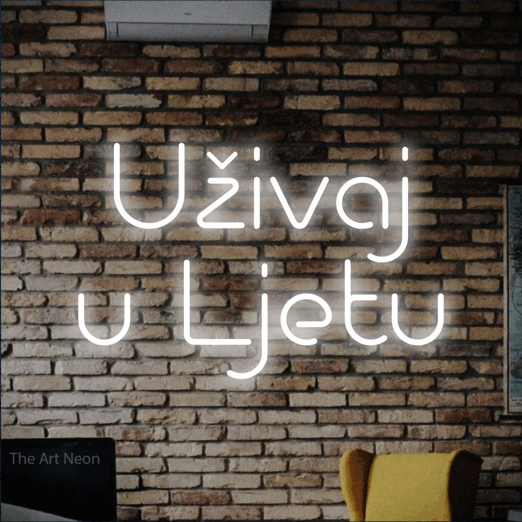 LED neon sign reading “Uživaj u Ljetu”, arranged in two lines.
