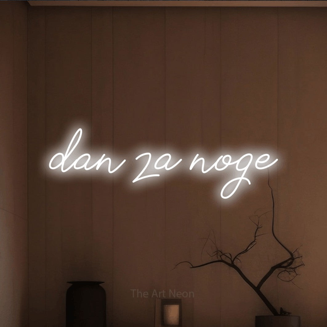 LED neon sign reading “dan za noge”, arranged in a single line.