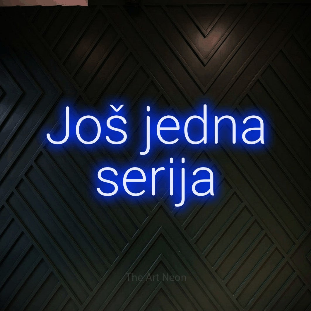 LED neon sign reading “Još jedna serija”, arranged in two lines.
