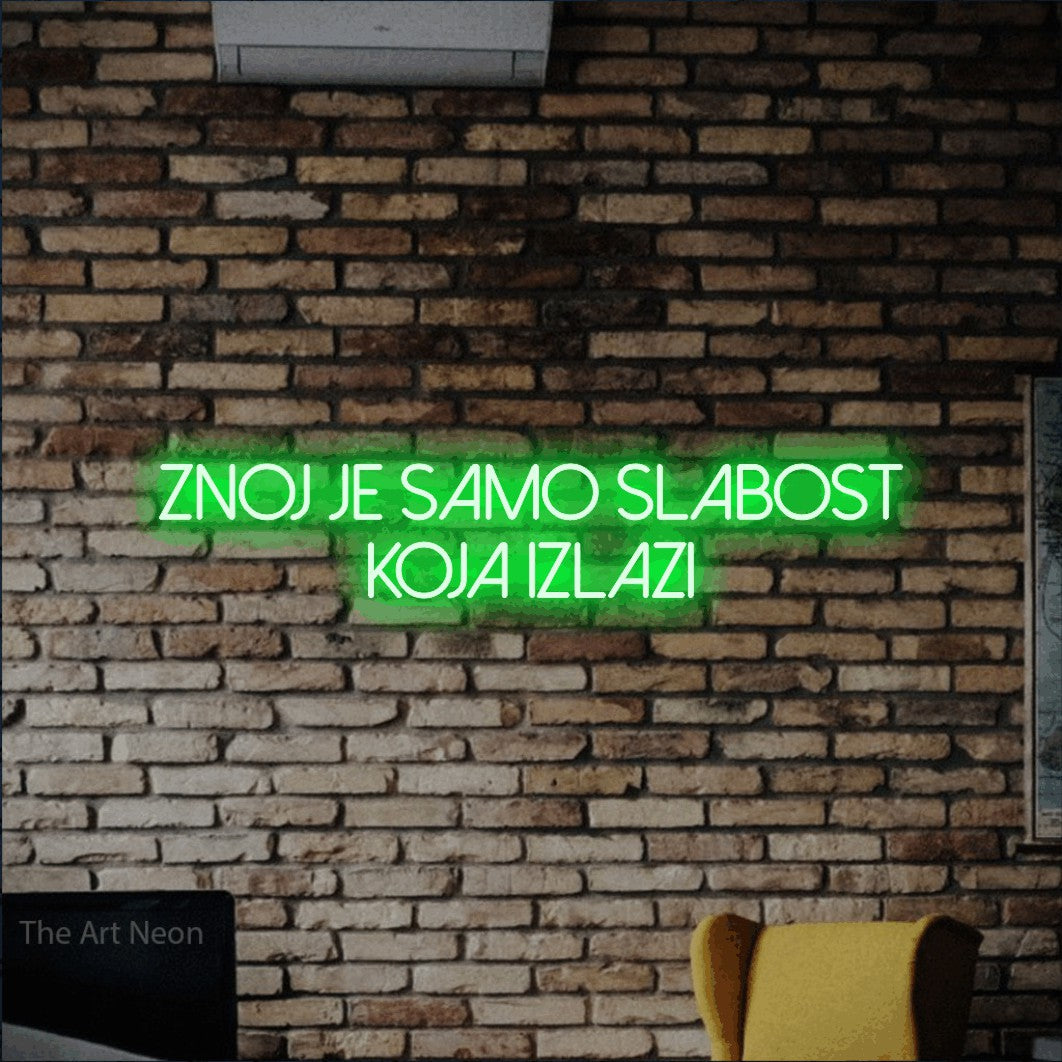 LED neon sign reading “ZNOJ JE SAMO SLABOST KOJA IZLAZI”, arranged in two lines.