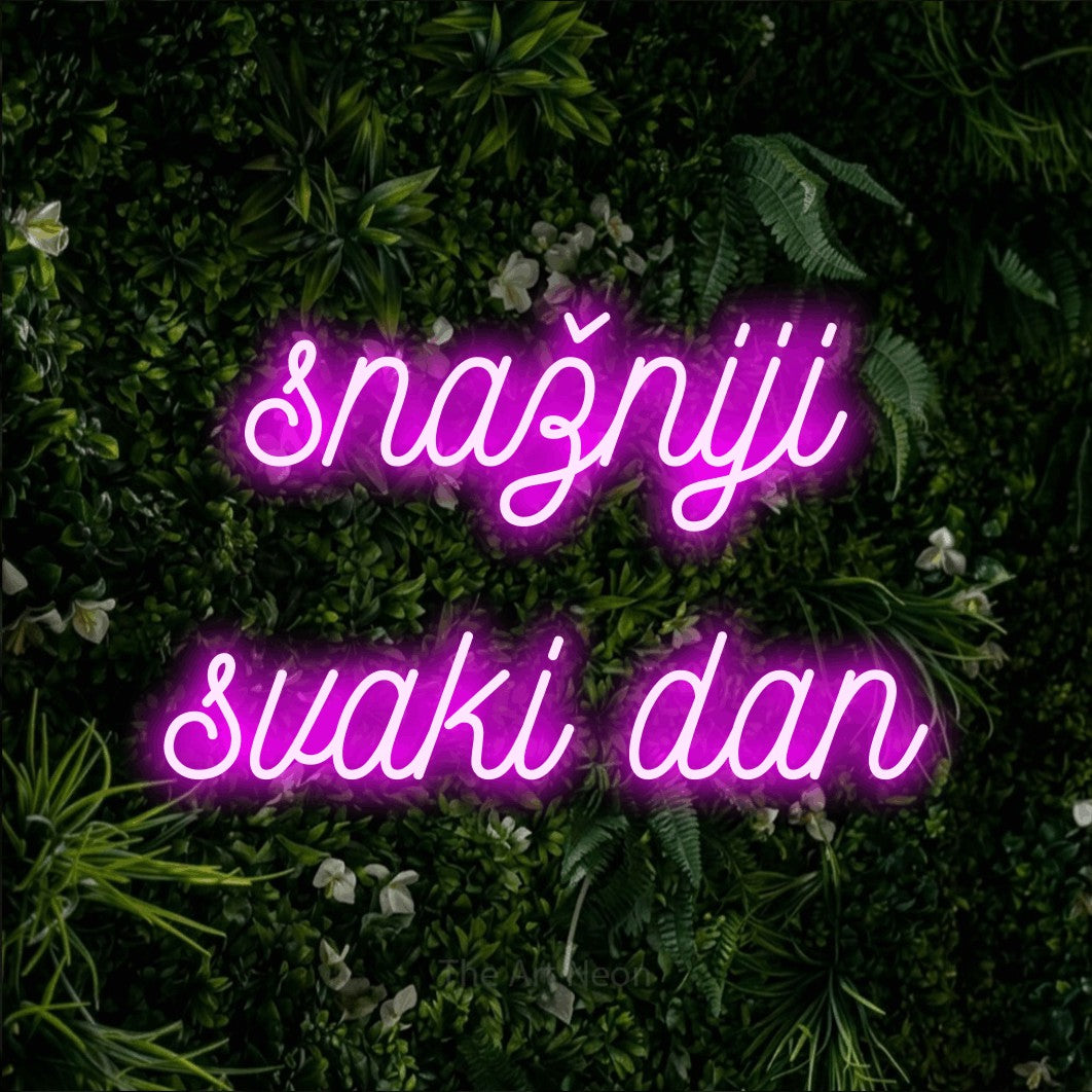 LED neon sign reading “snažniji svaki dan”, arranged in two lines.