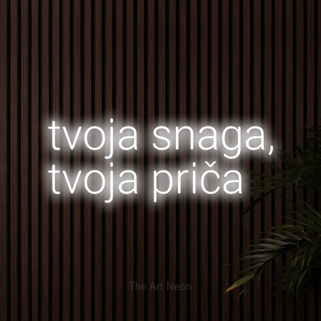 LED neon sign reading “tvoja snaga, tvoja priča”, arranged in two lines.