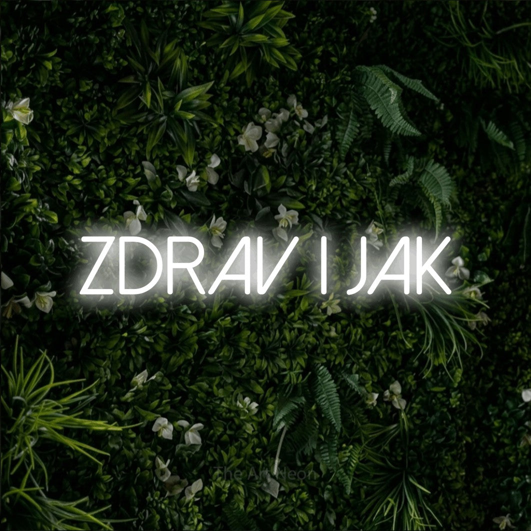 LED neon sign reading “ZDRAV i jak”, arranged in a single line.