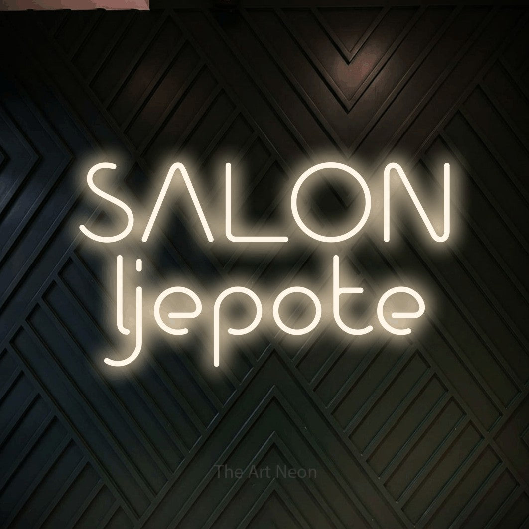 LED neon sign reading “SALON ljepote”, arranged in two lines.