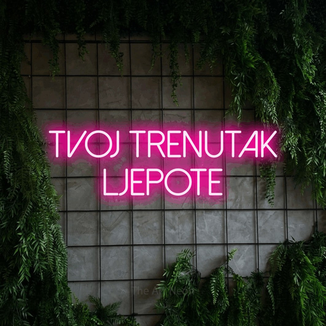 LED neon sign reading “TVOJ TRENUTAK LJEPOTE”, arranged in two lines.