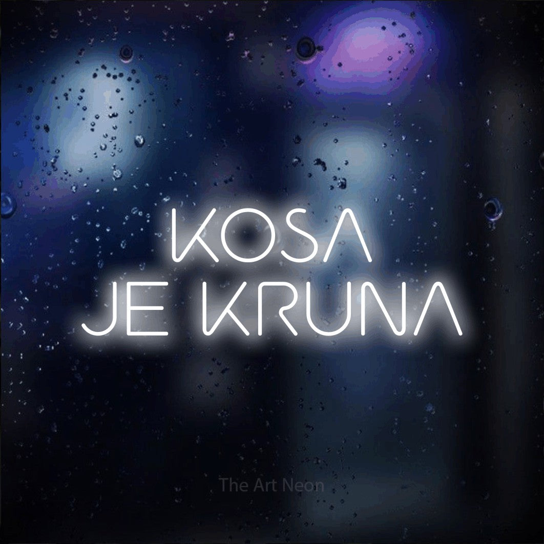 LED neon sign reading “KOSA JE KRUNA”, arranged in two lines.