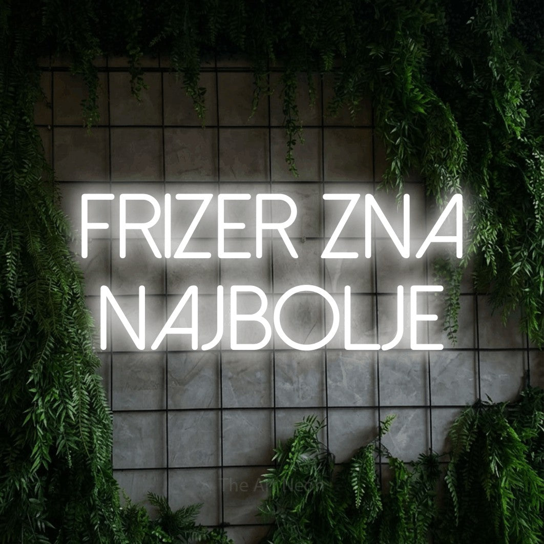 LED neon sign reading “frizer zna najbolje”, arranged in two lines.