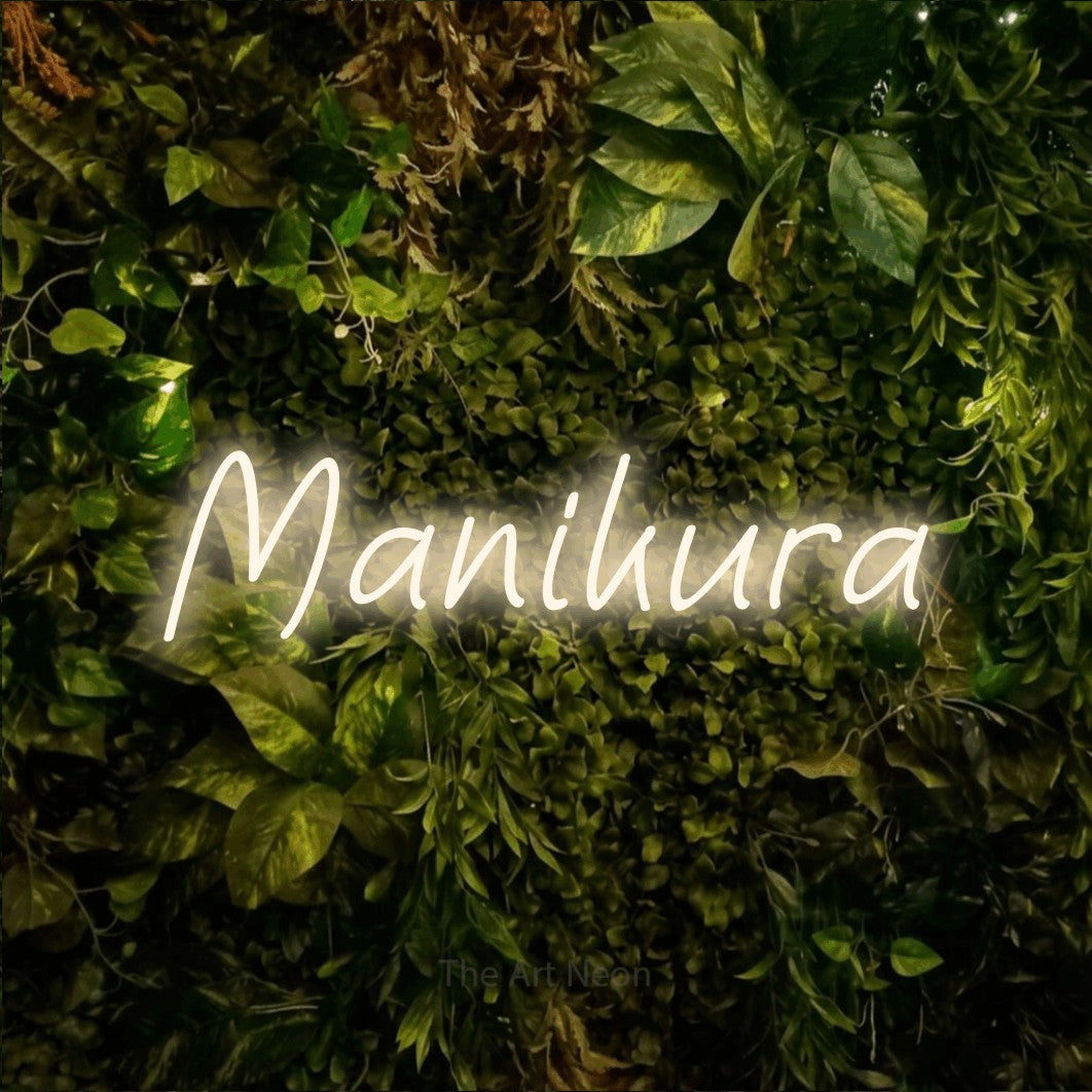 LED neon sign reading “Manikura”, arranged in a single line.