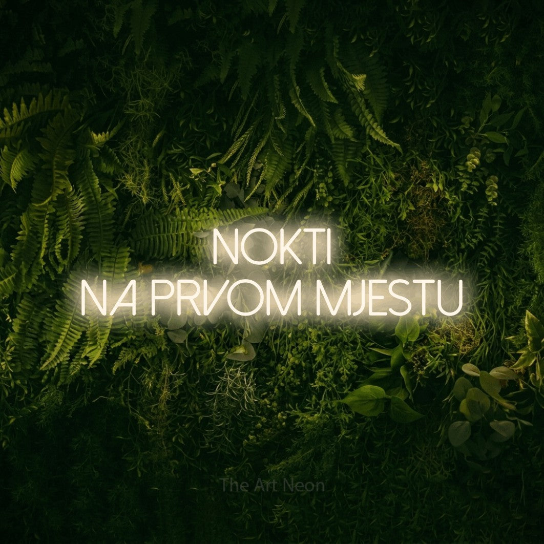 LED neon sign reading “Nokti na prvom mjestu”, arranged in two lines.