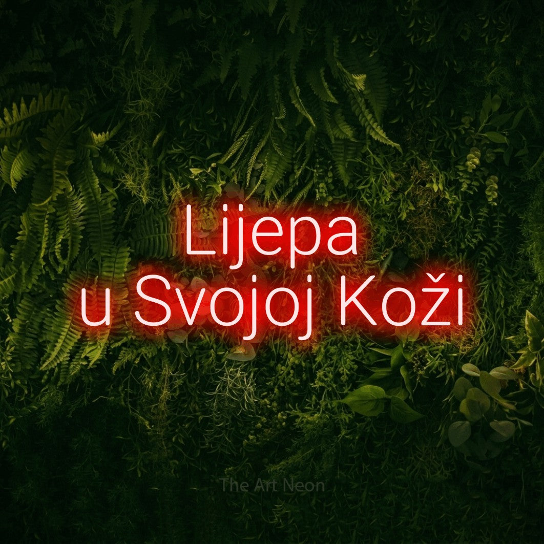 LED neon sign reading “Lijepa u Svojoj Koži”, arranged in two lines.